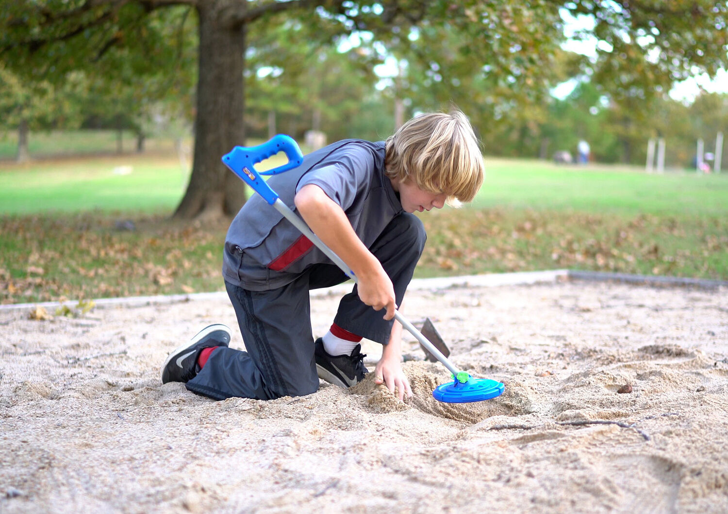 Child with junior metal detector